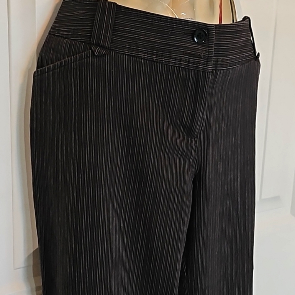 Flared slacks, great condition. Size 7. Dark gray with pinstripes. Pockets
